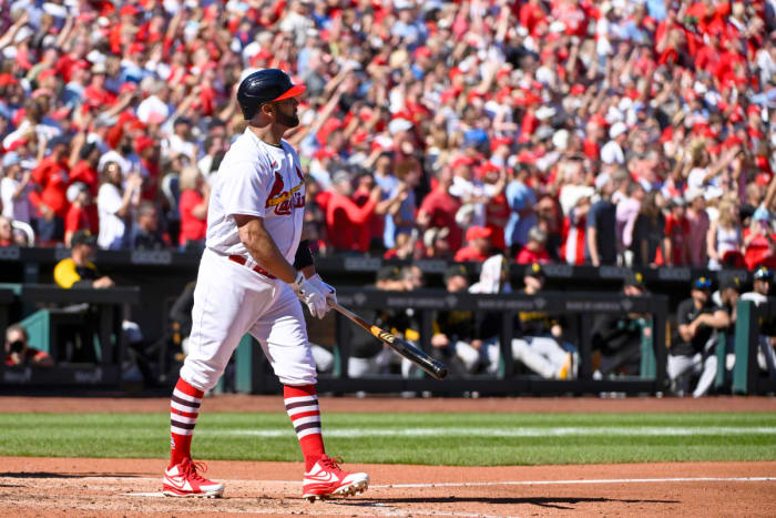 Albert Pujols watches his 702nd career home run go over the fence at Busch Stadium.